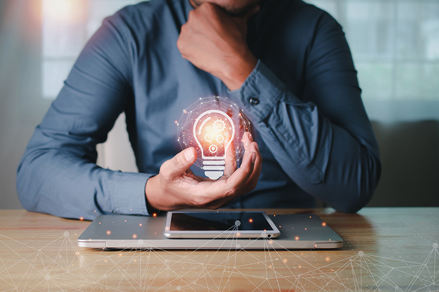 image of man with light bulb for improving-data-security-and-efficiency at Mullins & Treacy LLP Solicitors Waterford