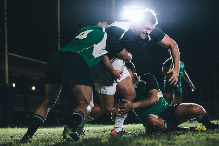image of men playing rugby by Mullins & Treacy LLP Solicitors Waterford