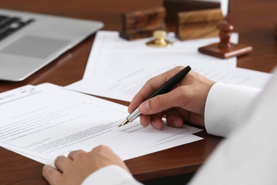 image of a person reviewing grant of probate or letters of administration